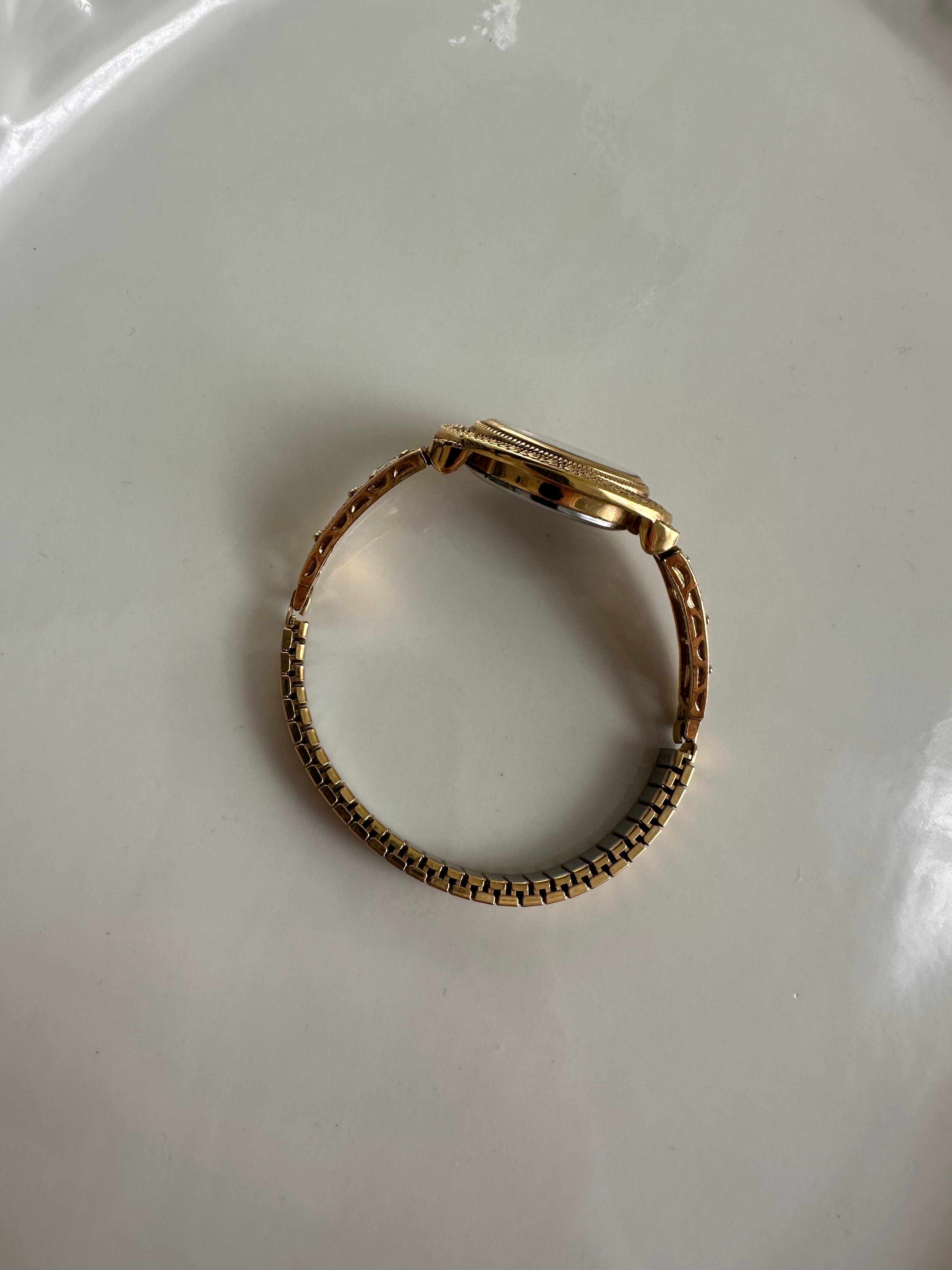 Victorian-Inspired Gold Filigree Bangle Watch with Mother of Pearl Face