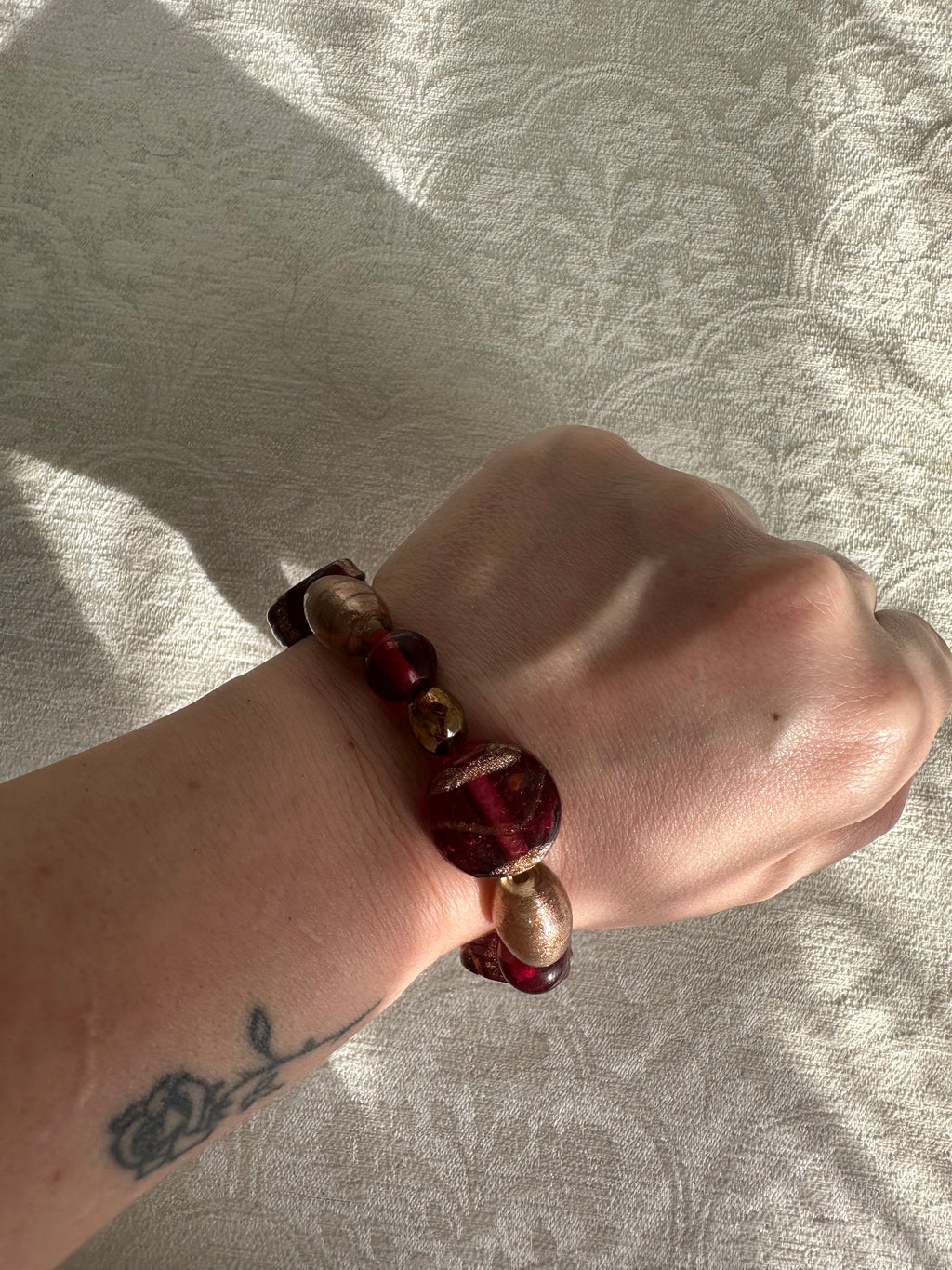 3 stacks of bracelets