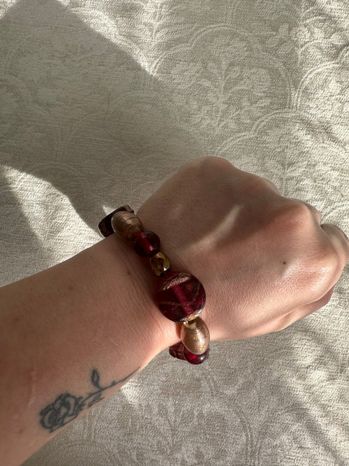 3 stacks of bracelets