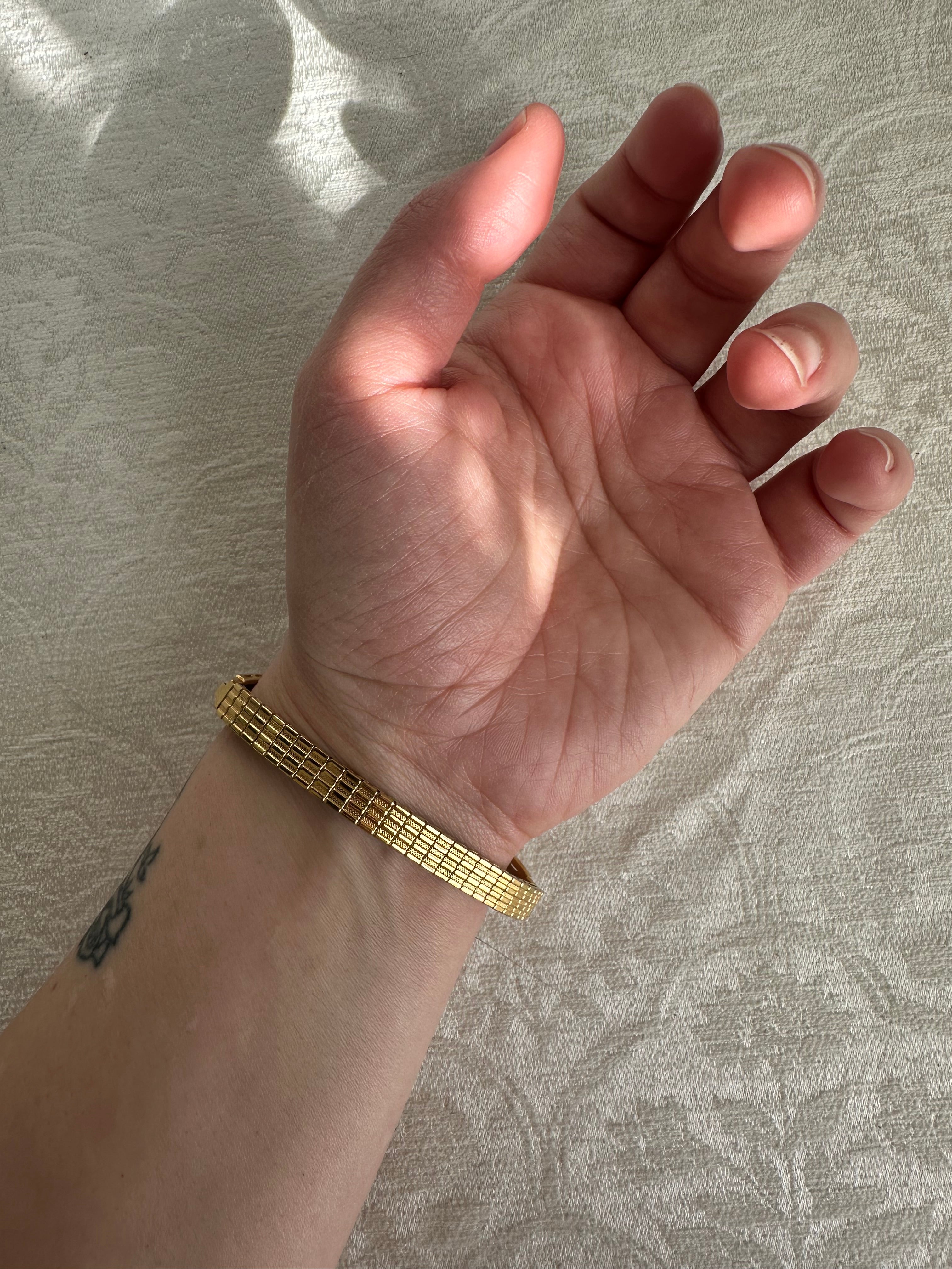 Victorian-Inspired Gold Filigree Bangle Watch with Mother of Pearl Face