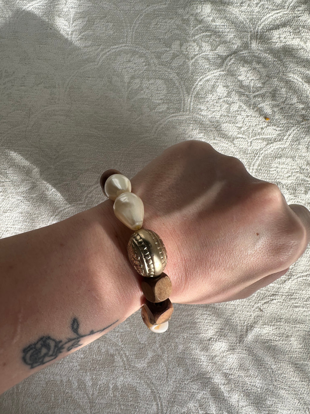 3 stacks of bracelets