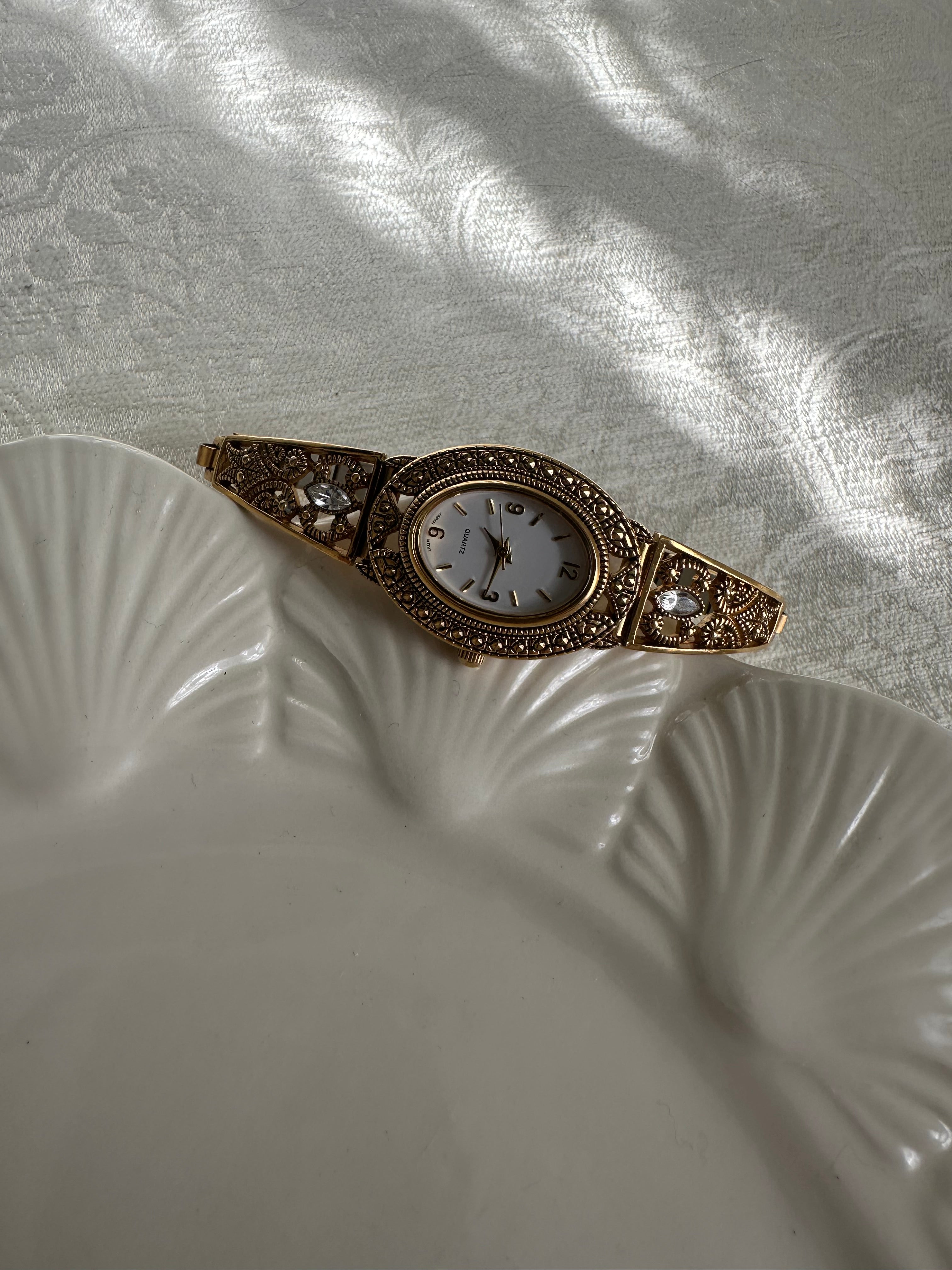 Victorian-Inspired Gold Filigree Bangle Watch with Mother of Pearl Face