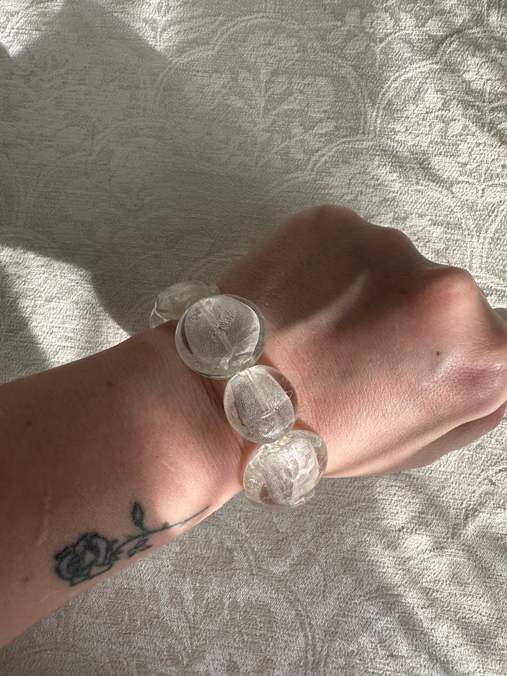 3 stacks of bracelets