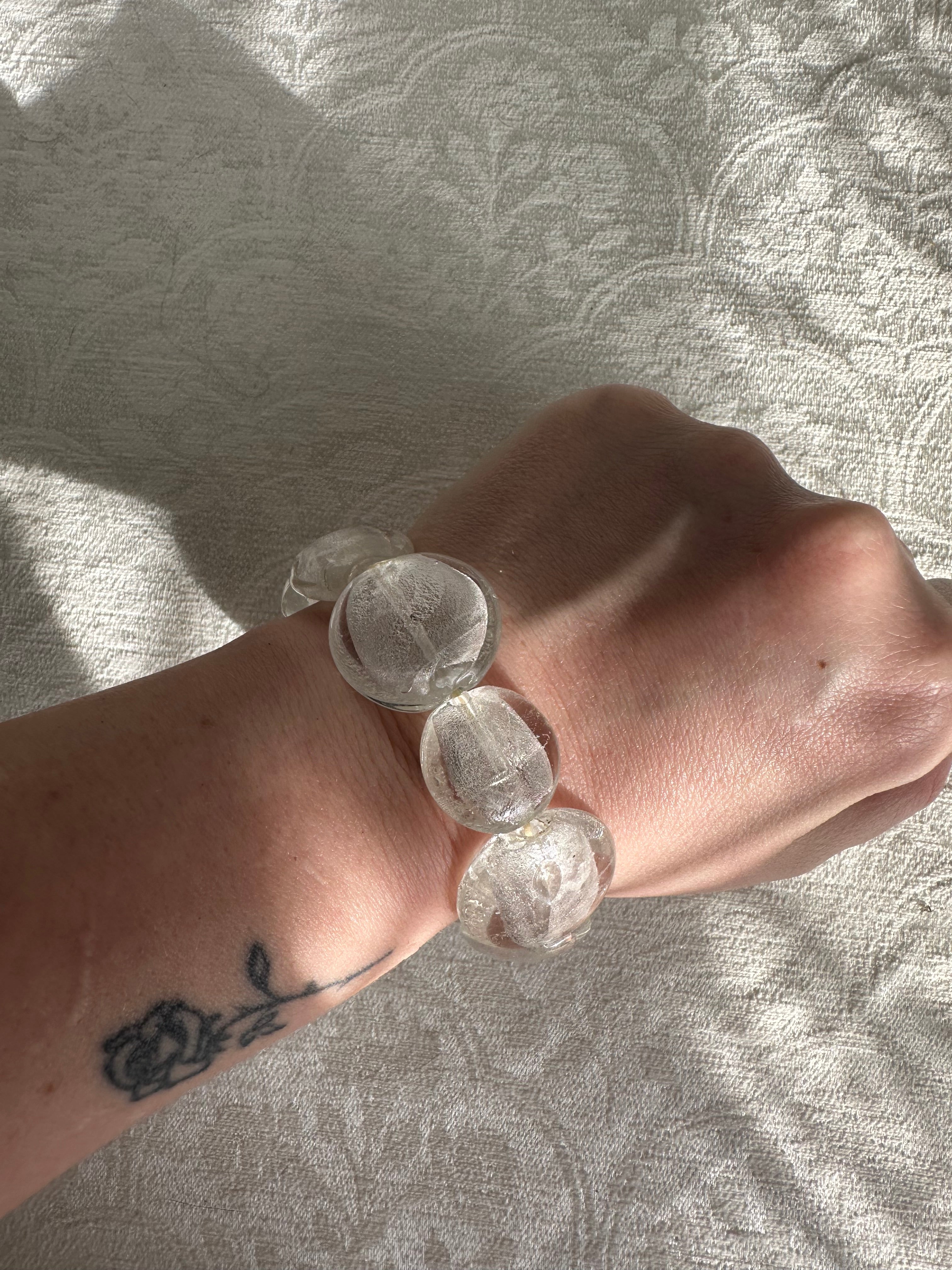 3 stacks of bracelets