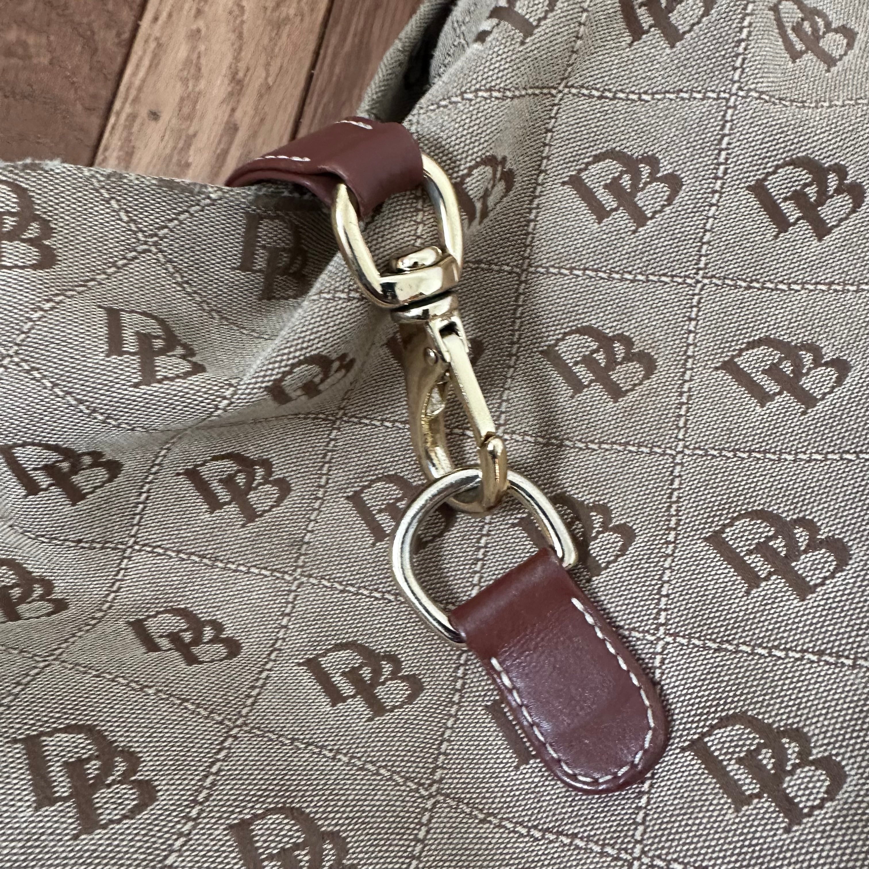 Dooney & Bourke Signature Monogram Canvas Logo Lock Hobo Bag