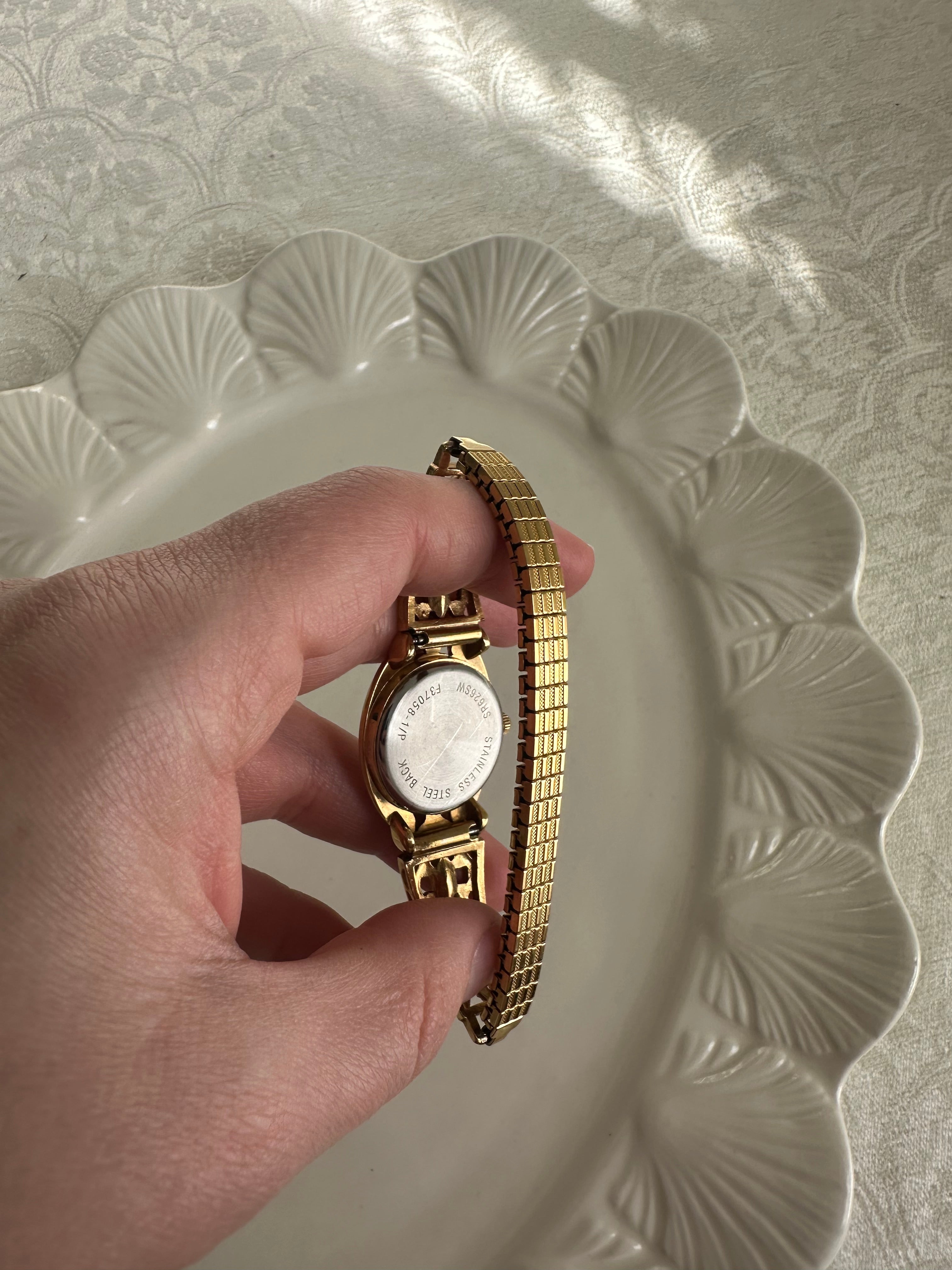 Victorian-Inspired Gold Filigree Bangle Watch with Mother of Pearl Face