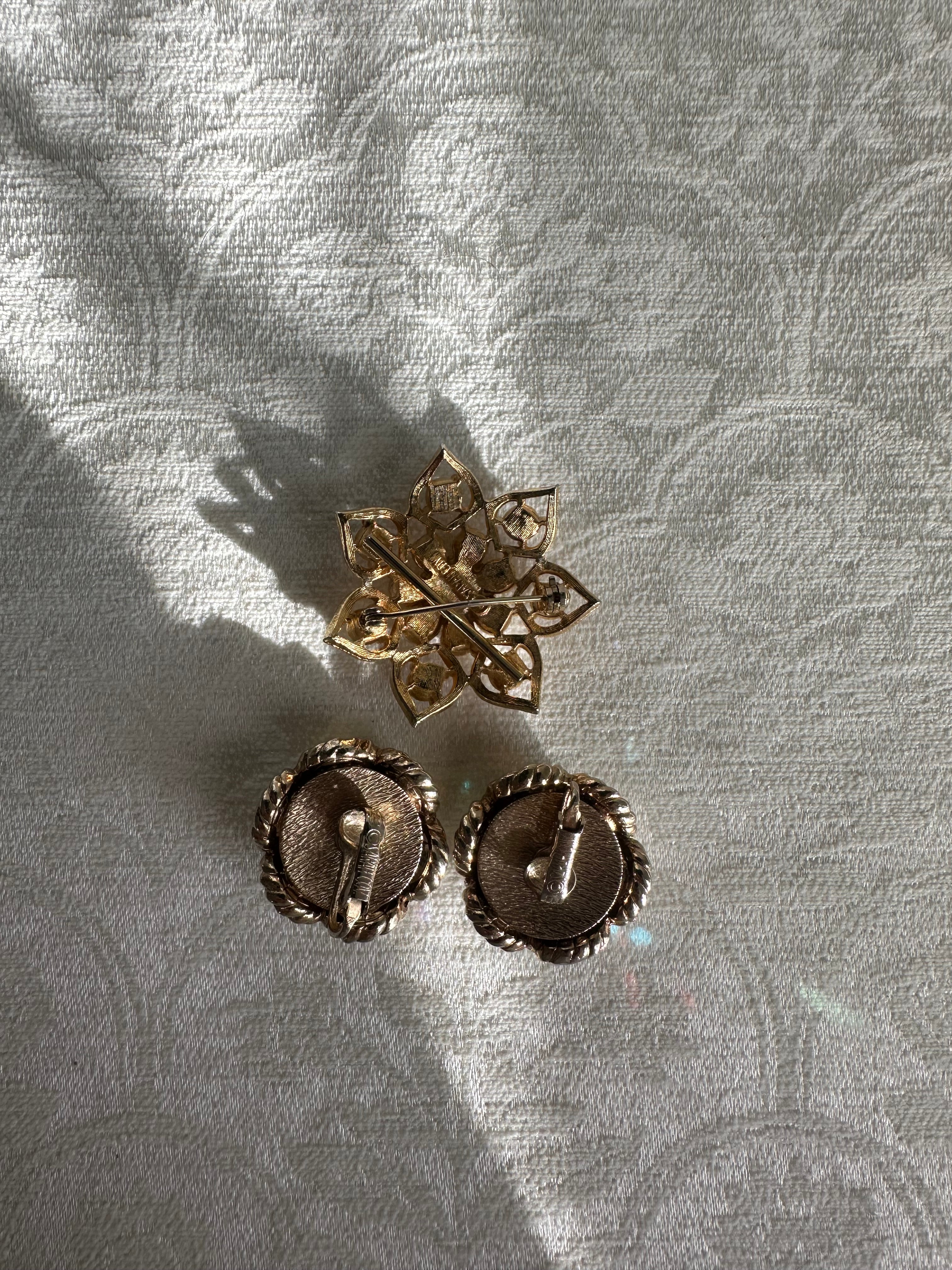 gold-tone flower brooch with pearls and clear crystal earrings
